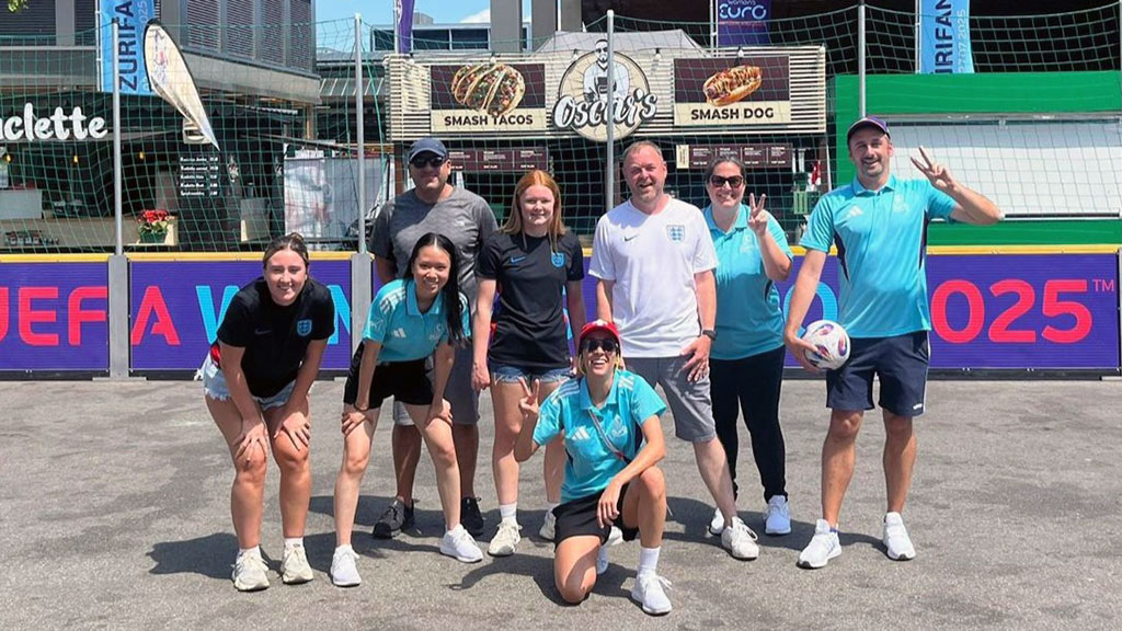 Volunteers in a 'team photo' pose
